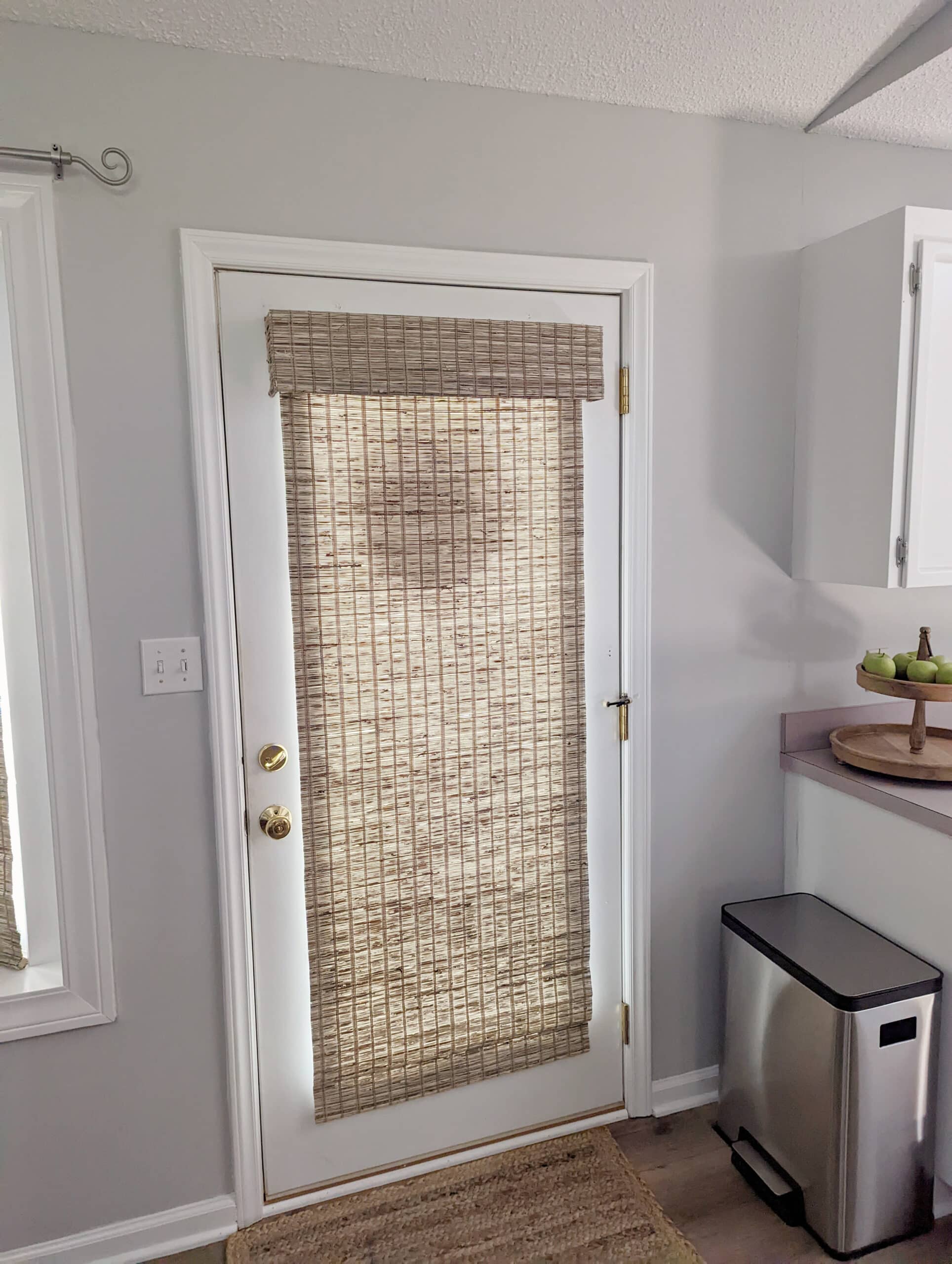 woven wood shade, natural shade, bamboo shade, shade on a door
