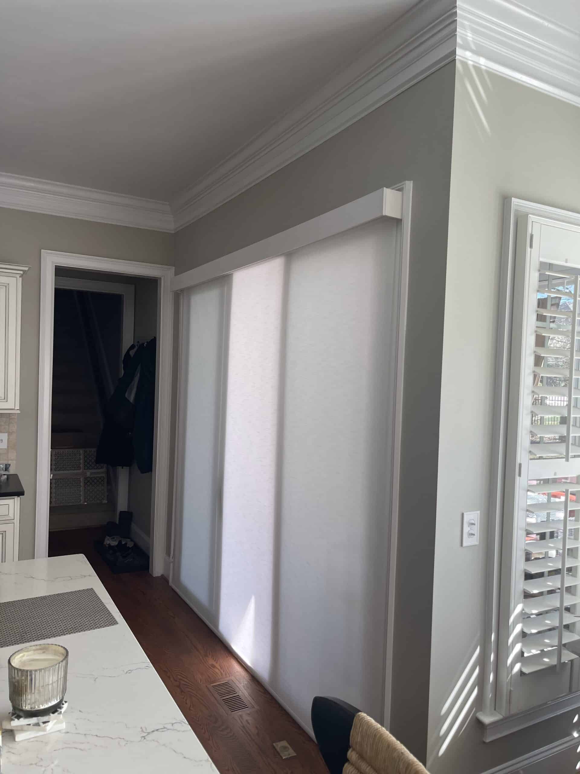 alta roller shade on sliding glass door metal fascia